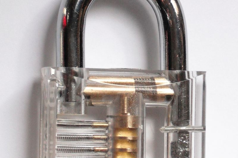Clear practice padlock showing pin tumblers